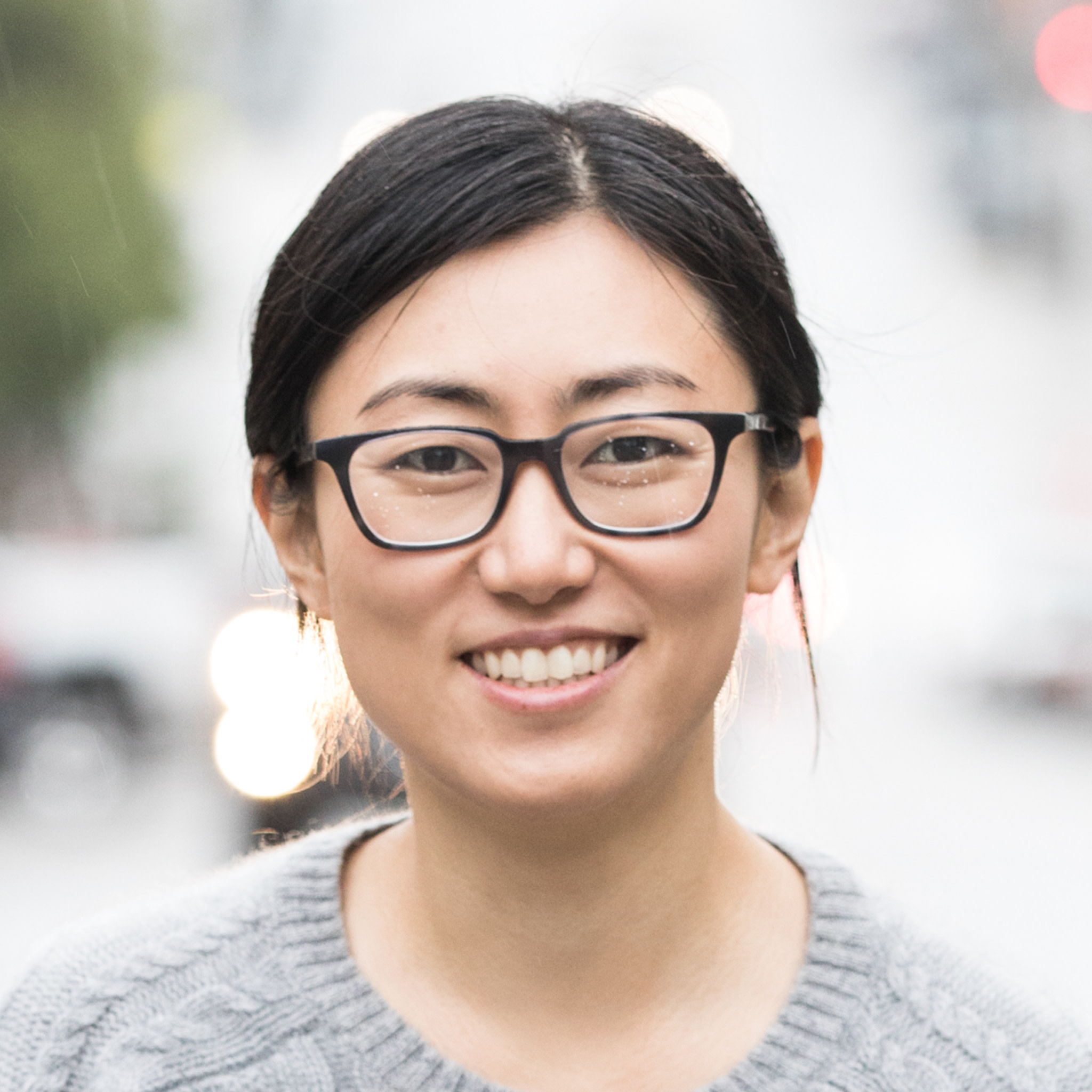 Nuna co-founder Jini Kim smiling outdoors