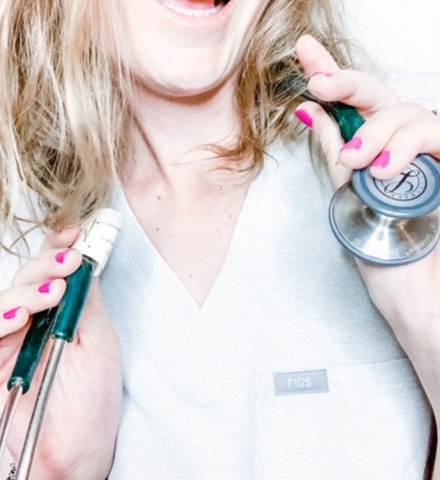 Nurse Fern website photograph showing white scrubs, pink nails, and a green stethoscope