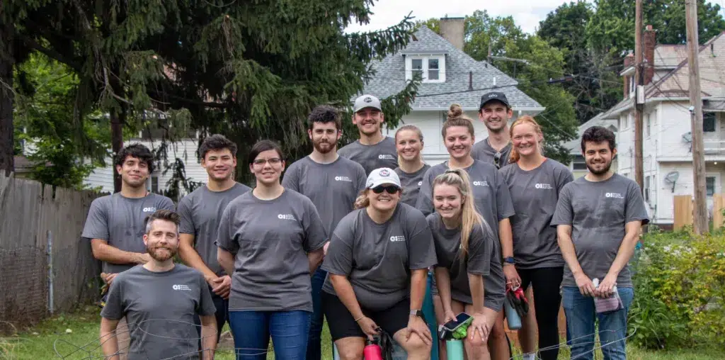 O-I employees and interns volunteering together