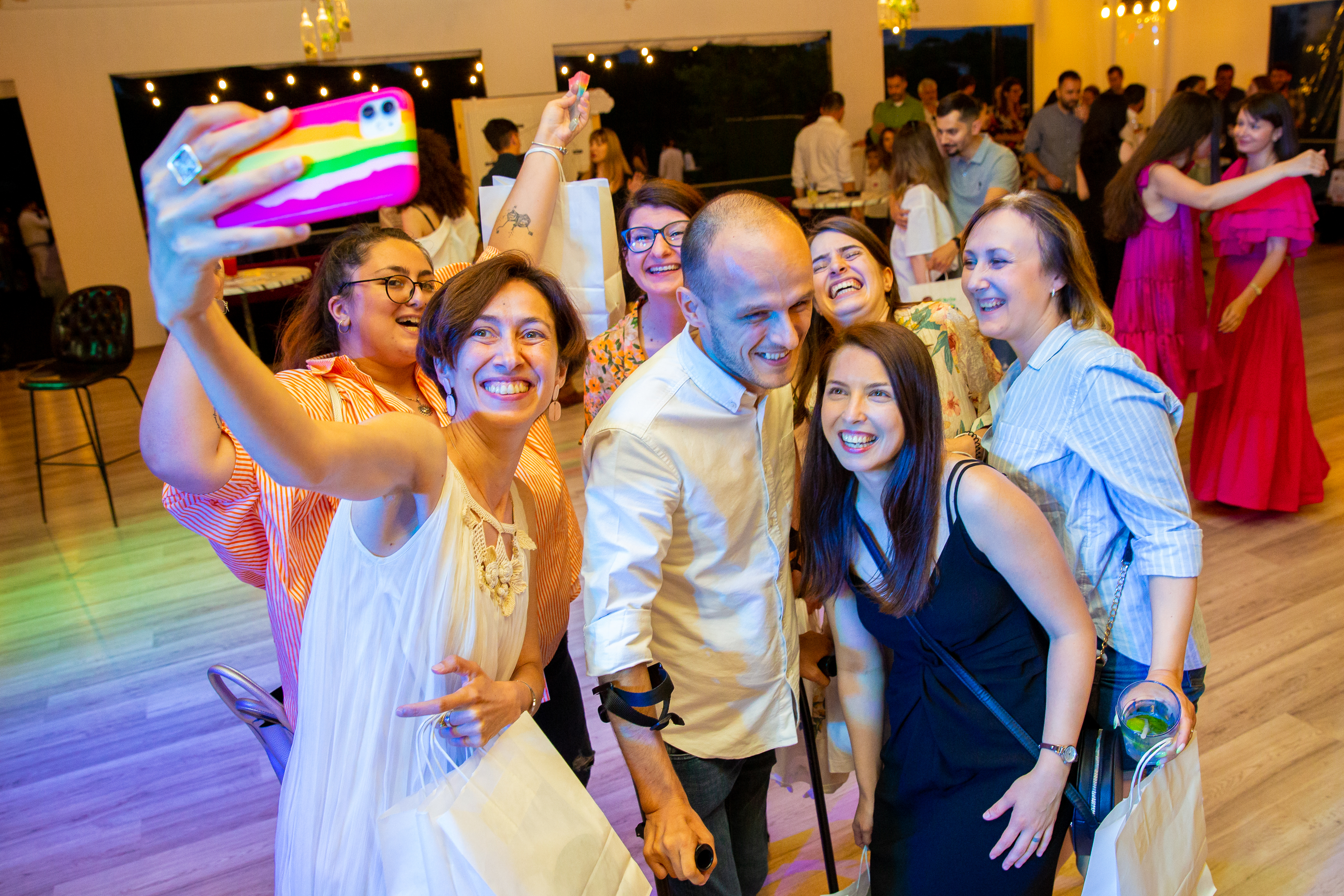 Oana Craioveanu joins a group selfie at Impact Hub Bucharest’s tenth-anniversary celebration in 2022