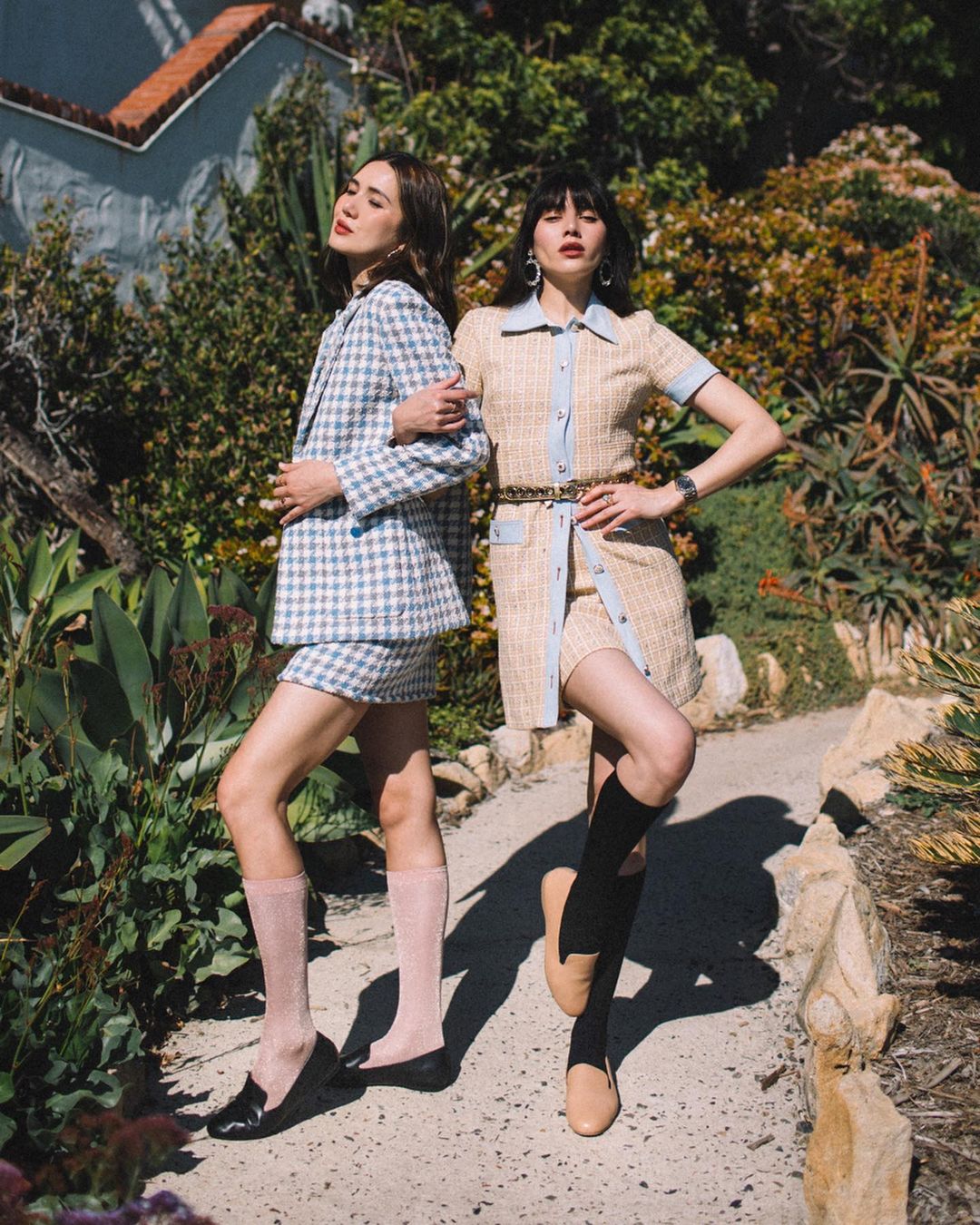 Two fashion influencers in coordinated tweed outfits from an Obviously campaign