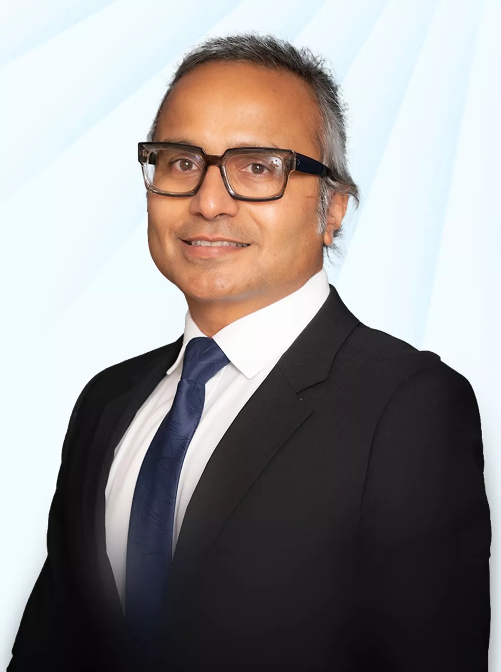 Occams Advisory founder Anupam Satyasheel in a dark suit
