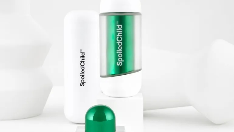 Colorful SpoiledChild skincare and haircare packaging