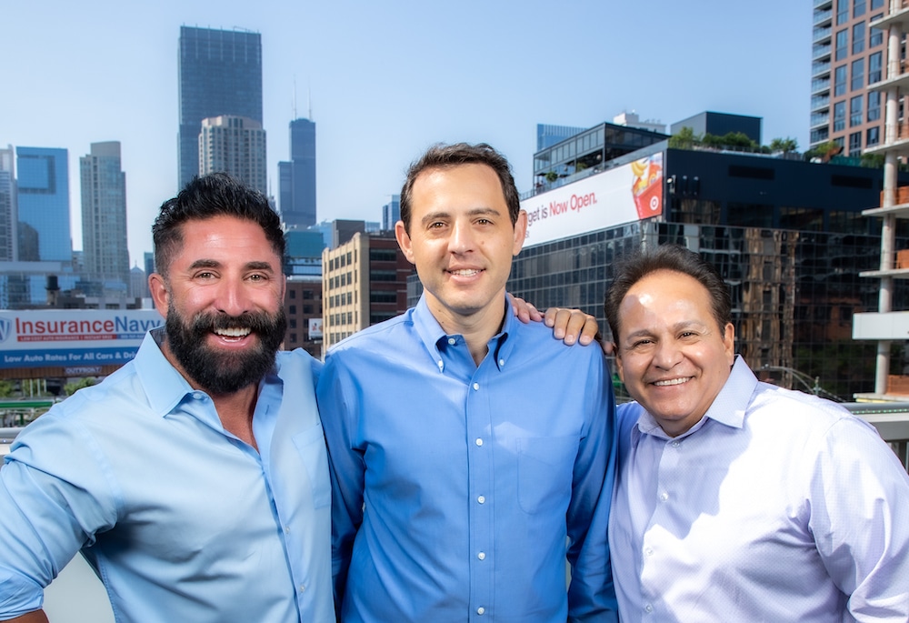 Connie Health co-founders Michael Scopa, Oded Eran and David Luna standing together outdoors