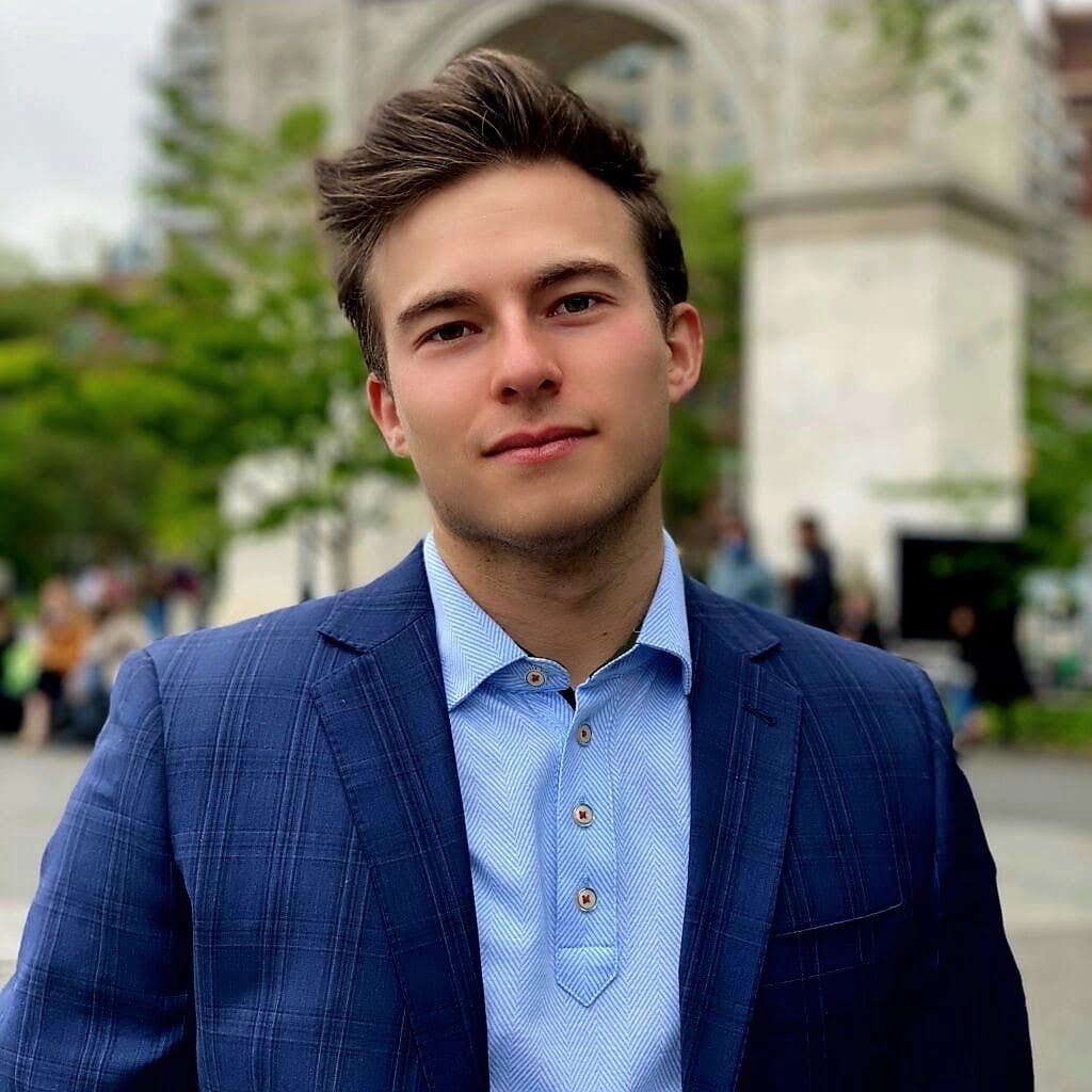 Official founder Zac Stern in a blue checked blazer