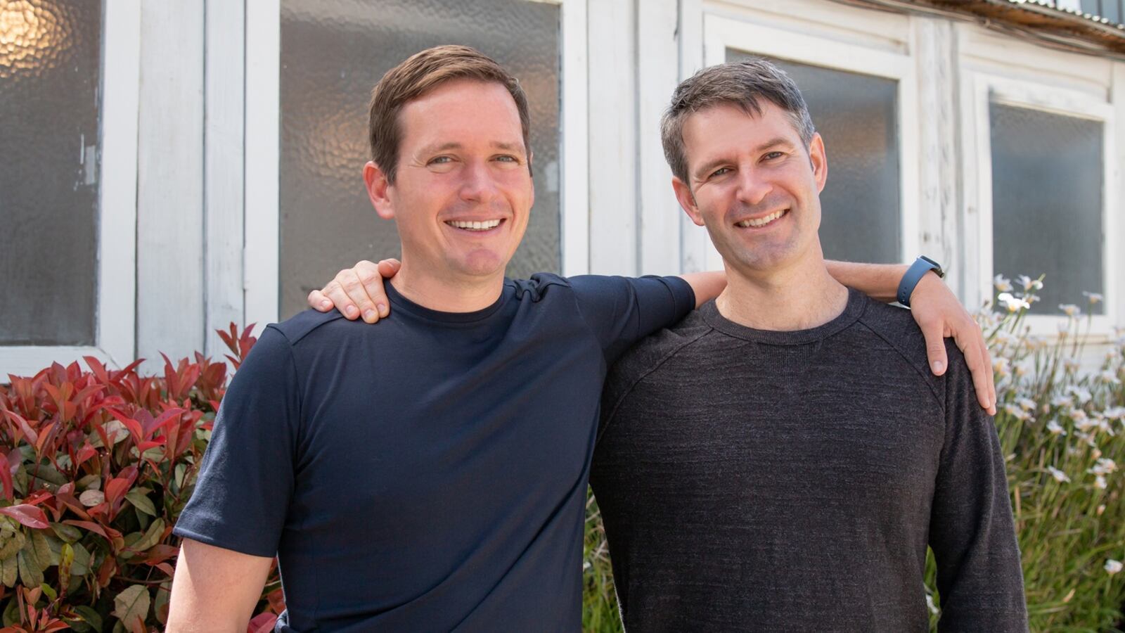 Recharge co-founders Oisin O’Connor and Mike Flynn standing together outside