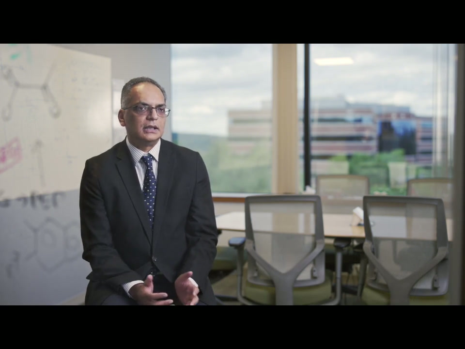 Transplant physician Anil Chandraker seated in a clinical office