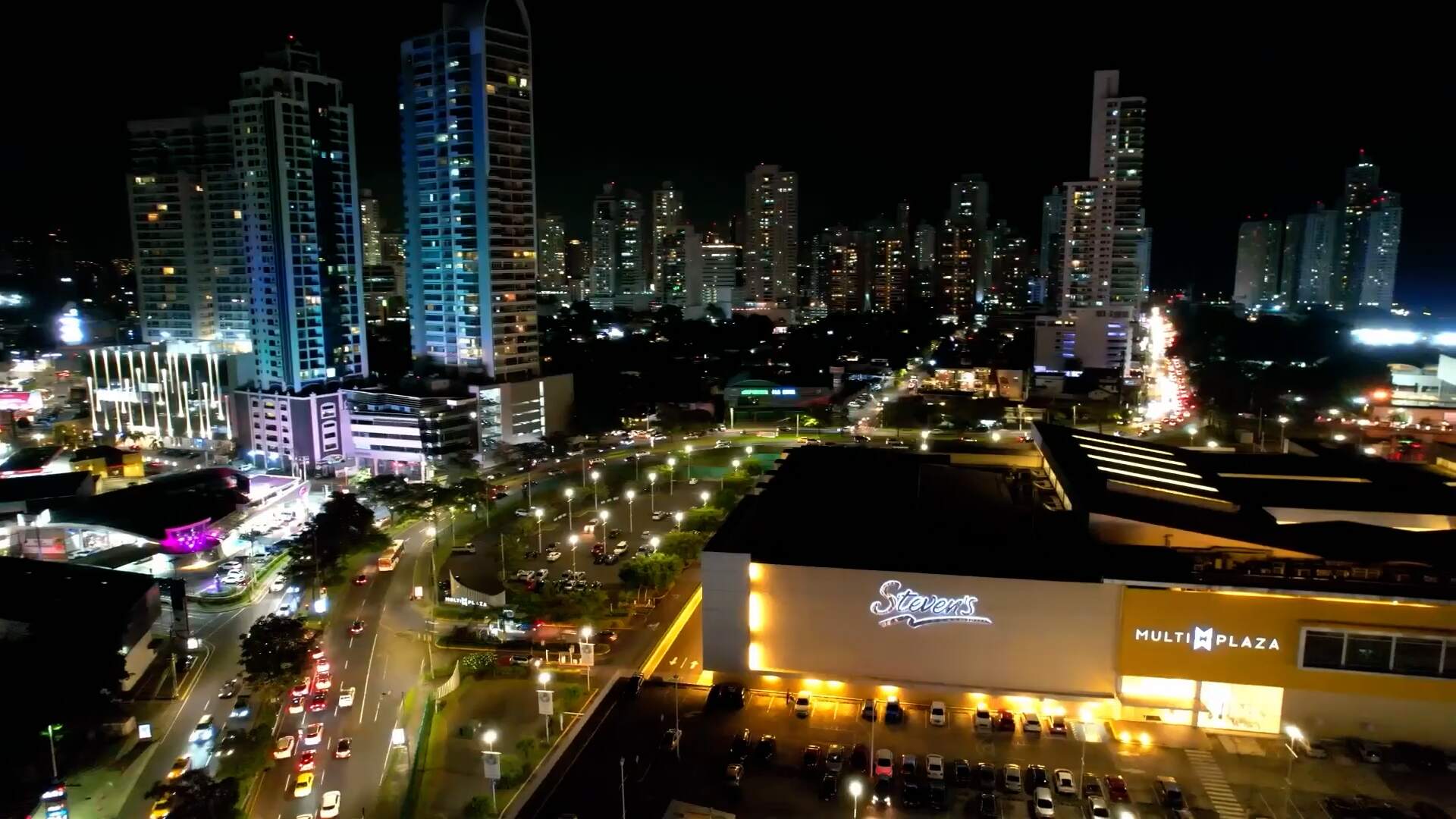 Stevens department store at Multiplaza beneath the illuminated Panama City skyline