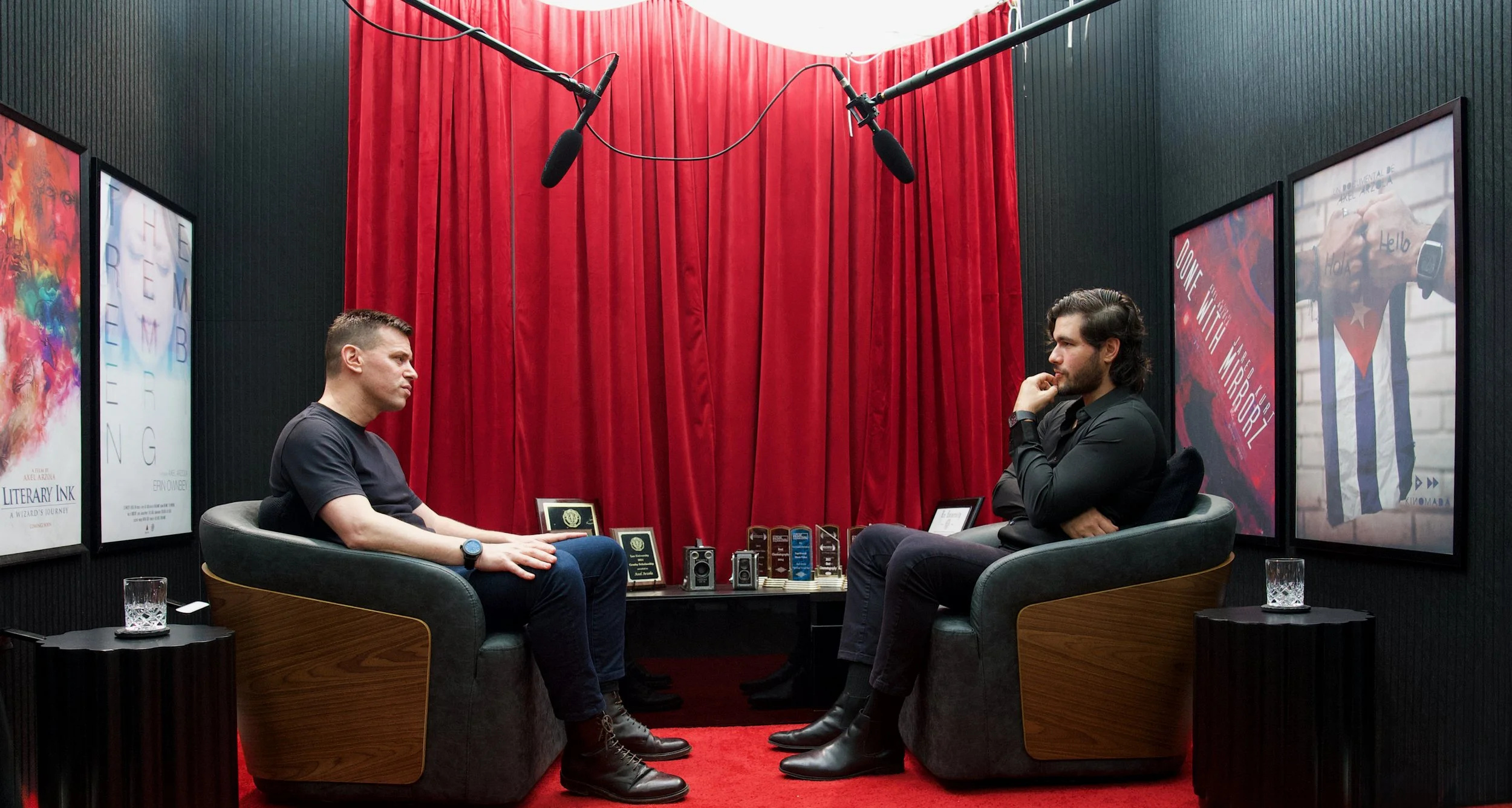 Omri Yoffe, left, in conversation with Axel Axe in a recording studio