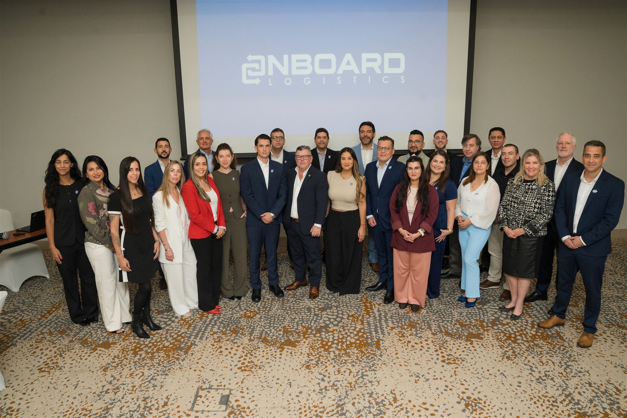 Members of the OnBoard Logistics corporate team gathered for a group photograph
