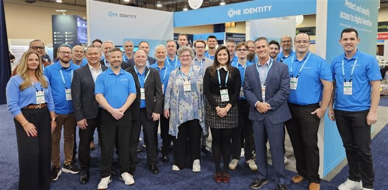 One Identity colleagues gathered at their booth at the Gartner IAM Summit 2025