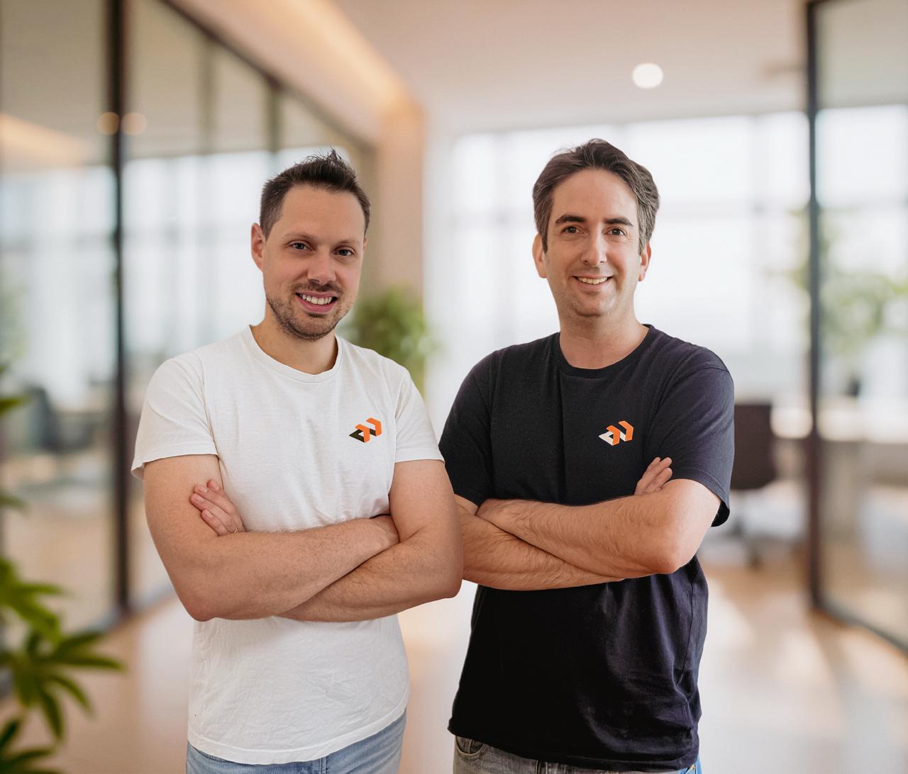 OneLayer co-founders Or Turgeman and Dave Mor standing together in an office
