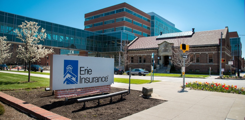 Erie Insurance sign outside its landscaped office buildings
