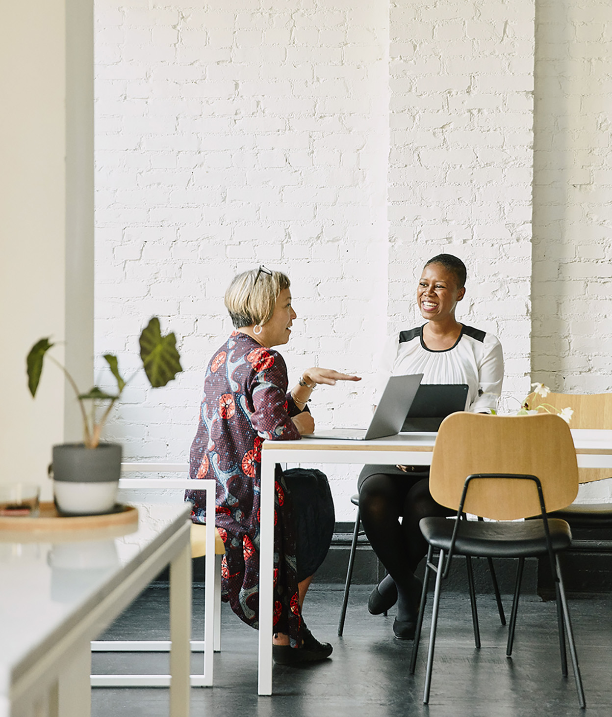 OneTrust employees collaborating around a table
