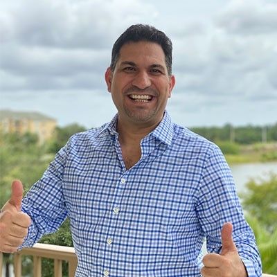 Portrait of OnPassive founder Ash Mufareh