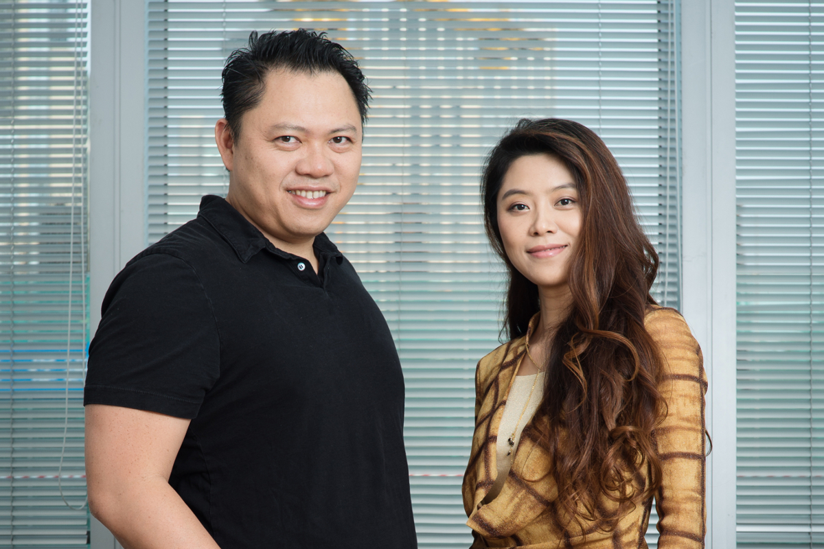 Operator CEO Robin Chan standing with Operator China CEO Yolanda Xue