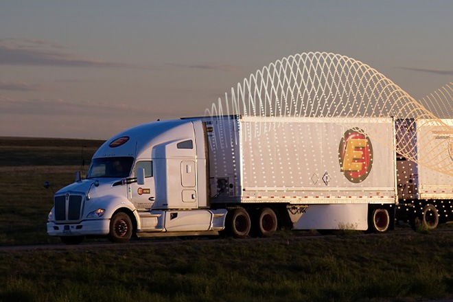 Estes tractor and trailers in Optym’s promotional case-study image