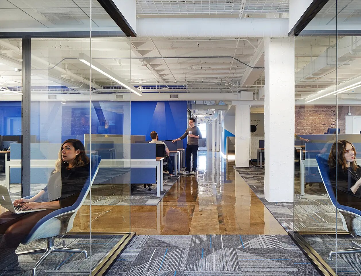 Employees working inside Origami Risk's Chicago office