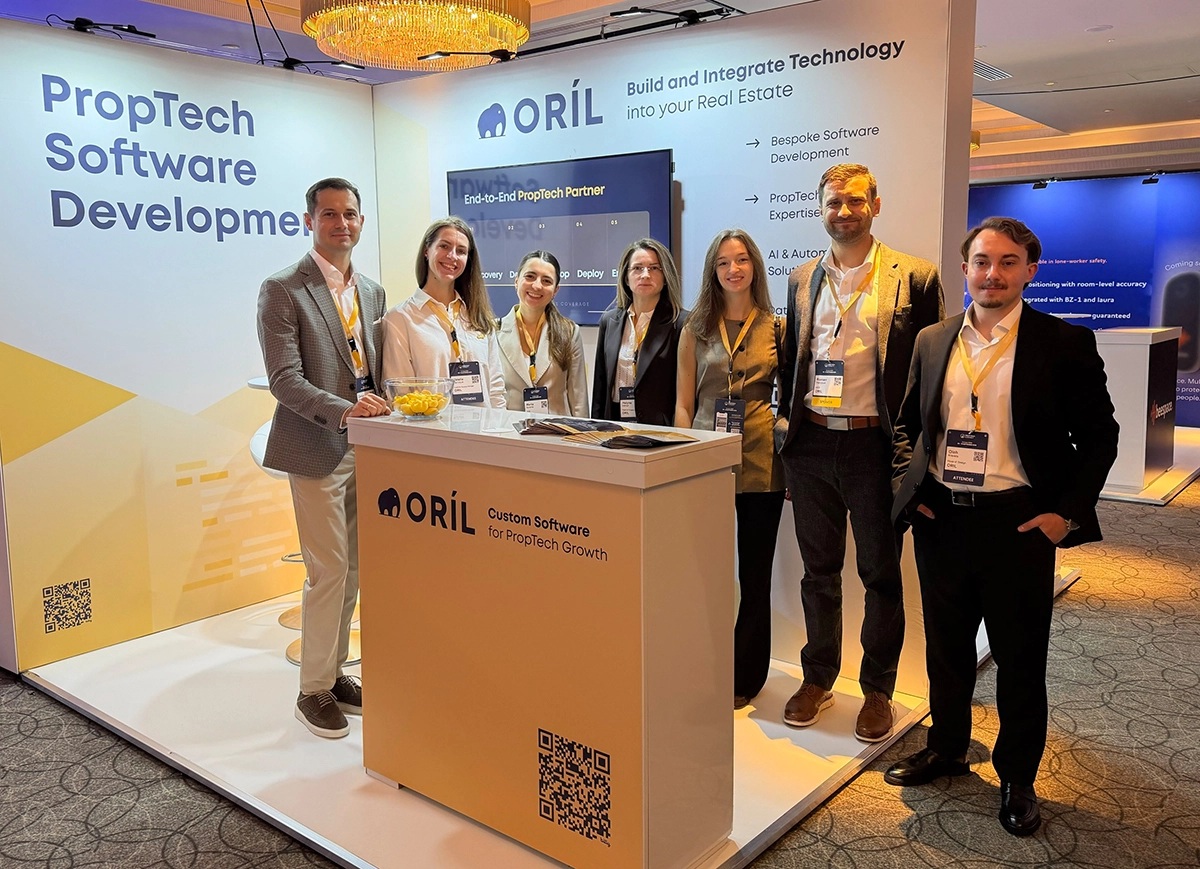ORIL team at its yellow-branded PropTech conference booth