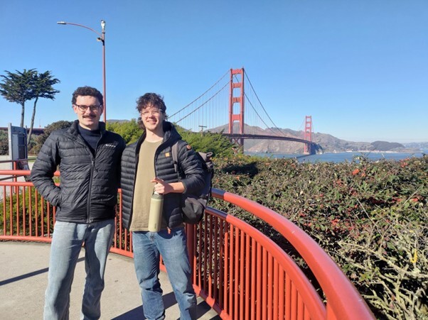 Oscar Brisset and Ben Kaye standing near the Golden Gate Bridge in San Francisco
