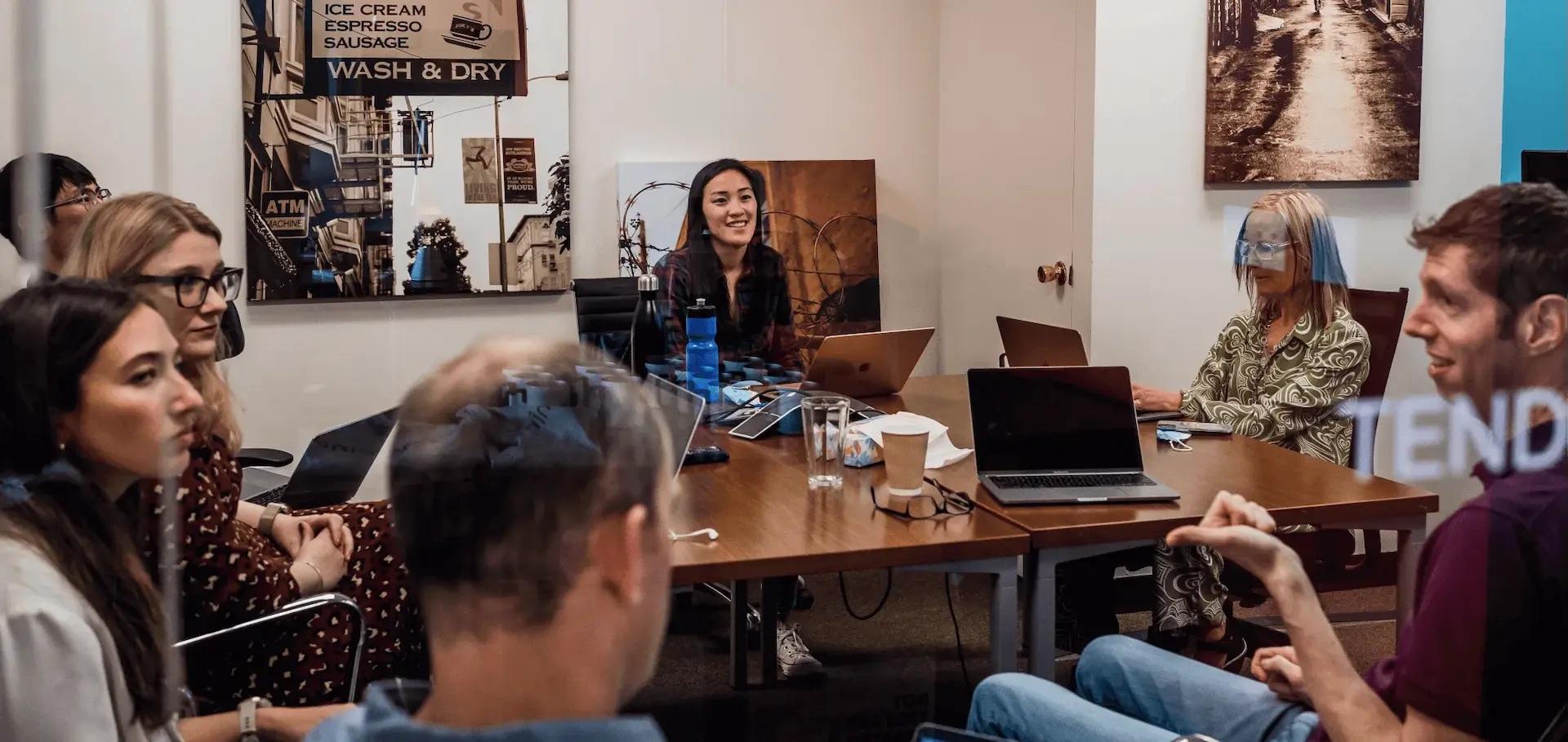 Osmind colleagues gathered in a room at a company reunion