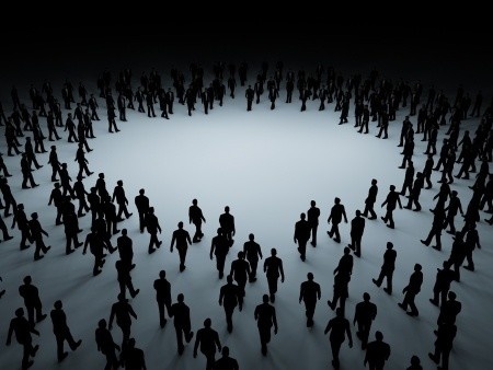 Illustration of human silhouettes arranged around an open central space