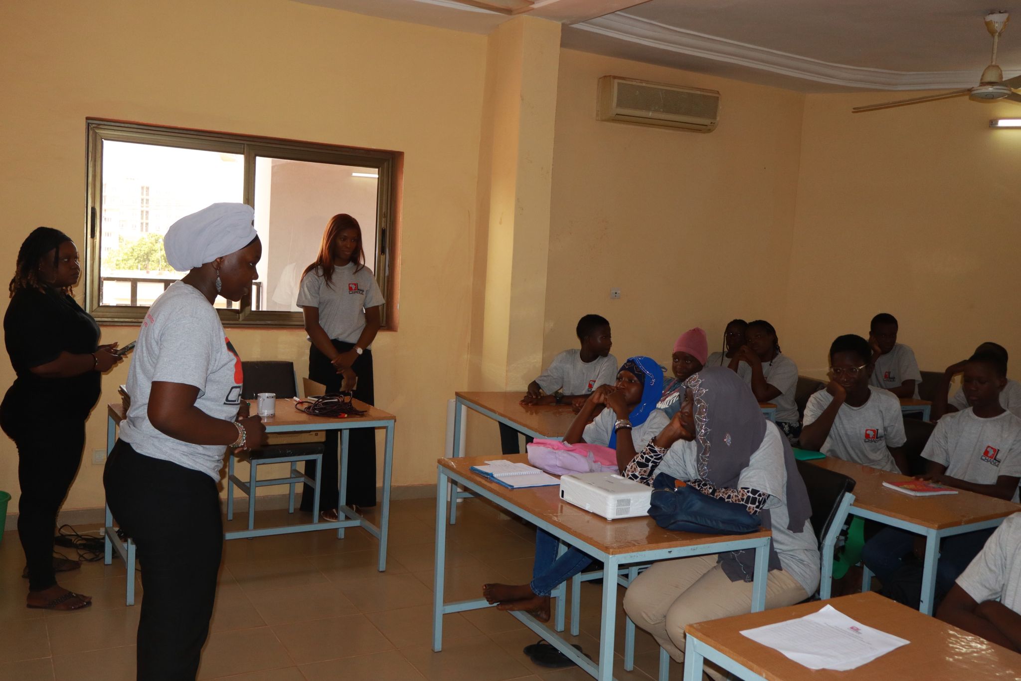Students and facilitators gathered in a Leading Change Africa classroom in Burkina Faso