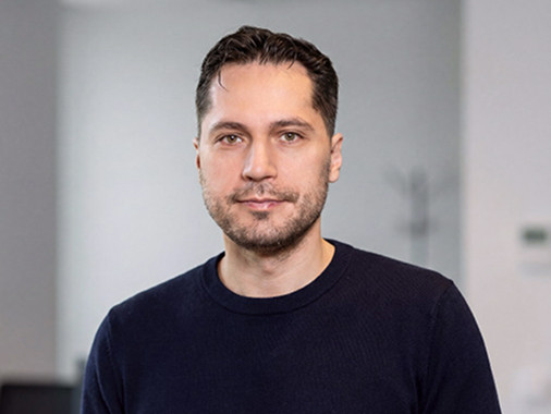 Portrait of Oxagile co-founder Dmitry Karpovich