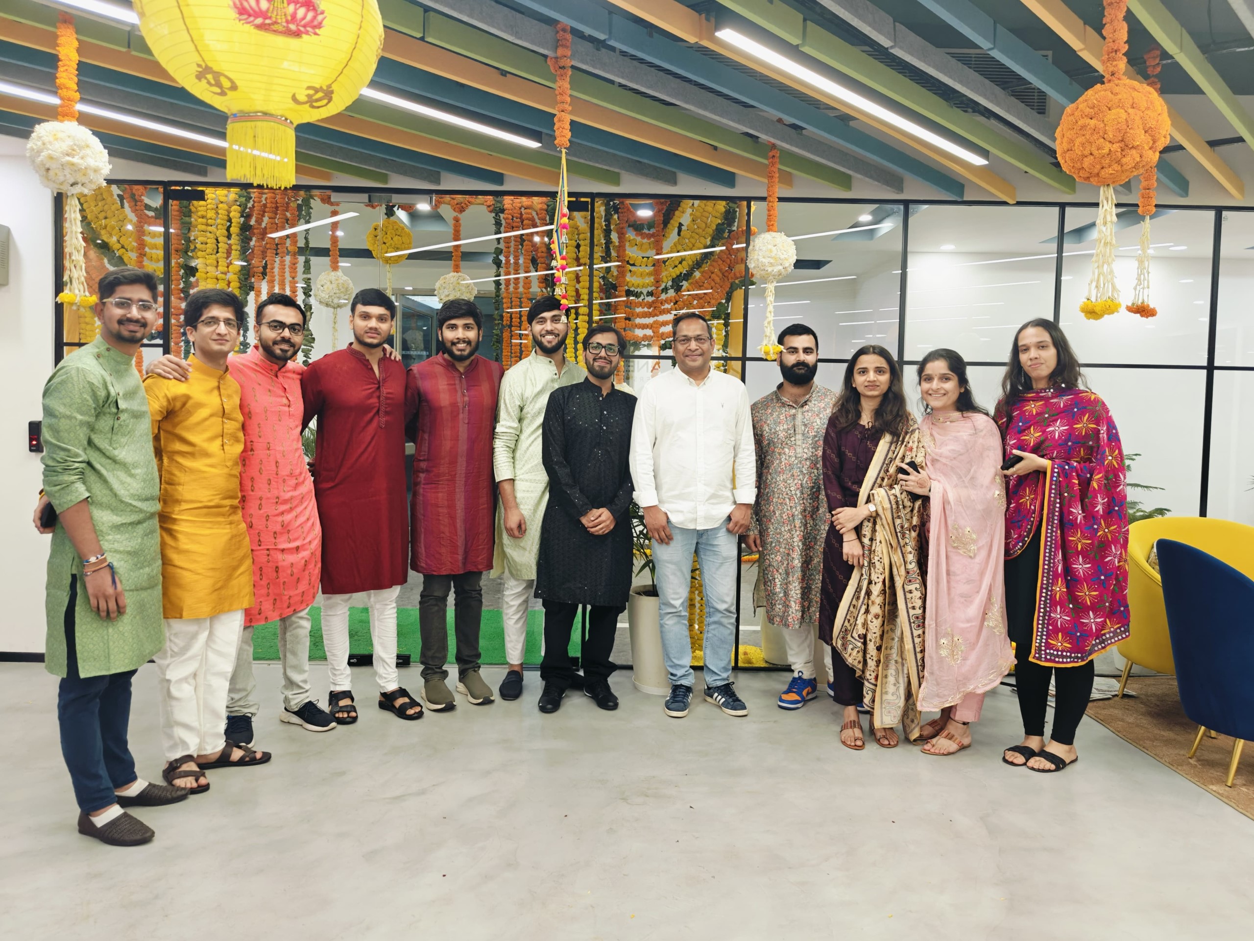 Oxane Partners colleagues gathered in the company's Hyderabad office during a festival celebration