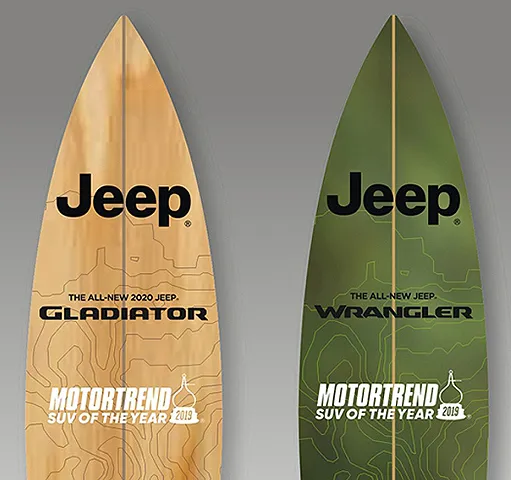 Two surfboard-shaped pieces bearing Jeep and MotorTrend branding