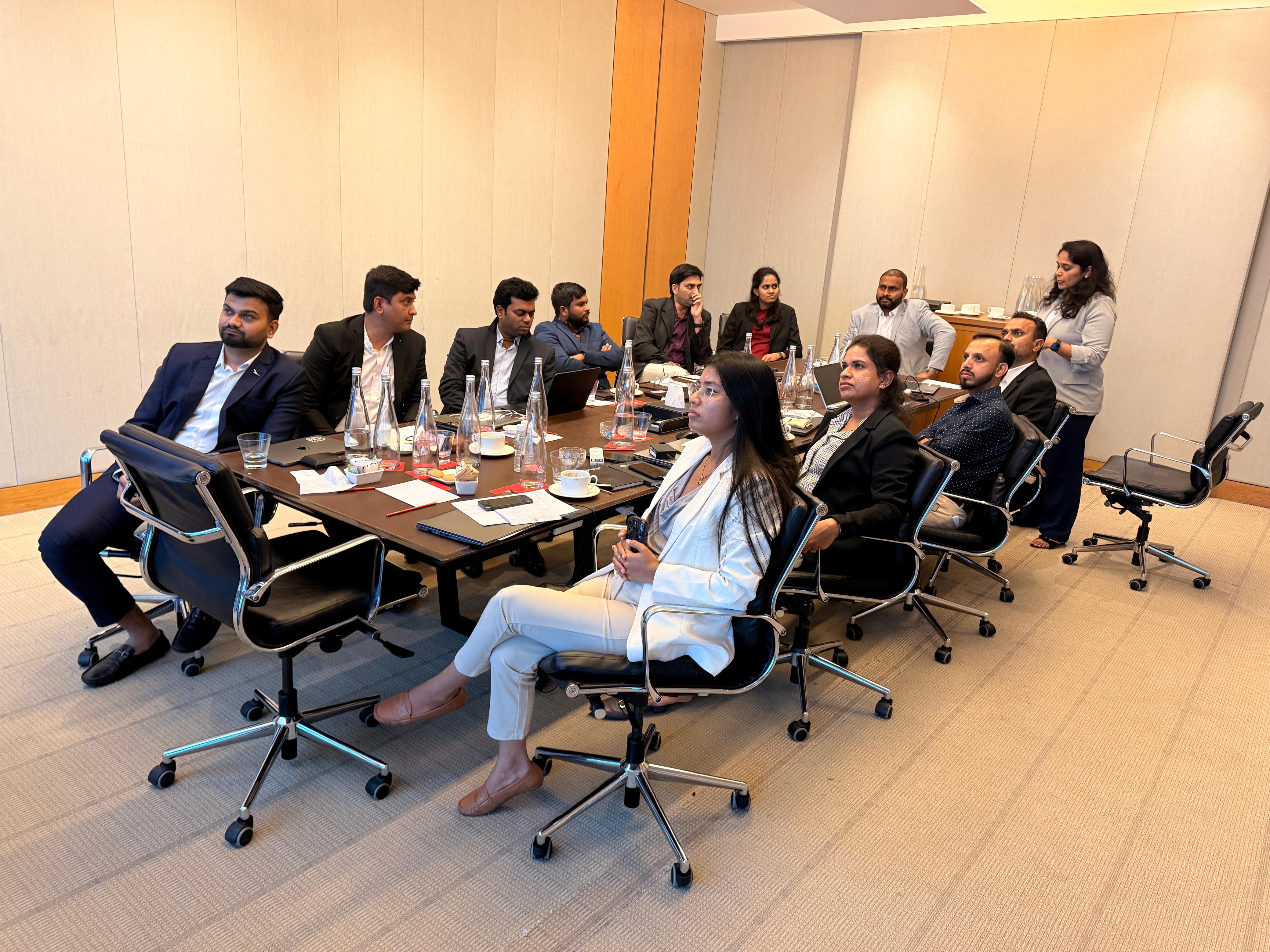 A company-published photograph of P99SOFT colleagues gathered in the office