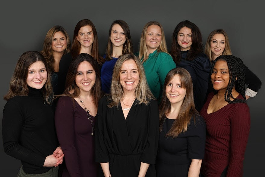 The Pace Public Relations team posed together in a studio