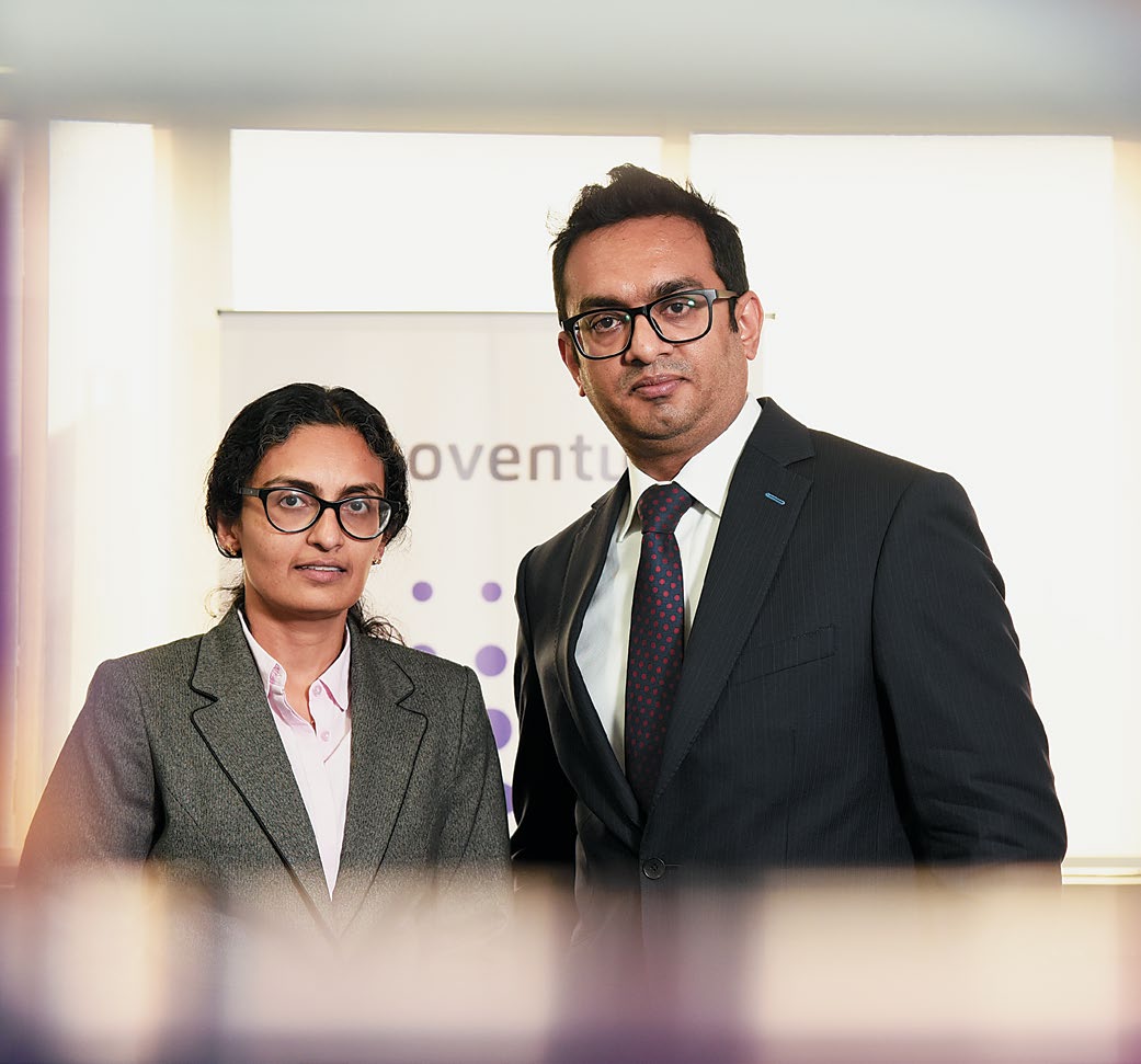 Shalini V Nair and Padmakumar Nair standing together at Ennoventure’s Bengaluru office
