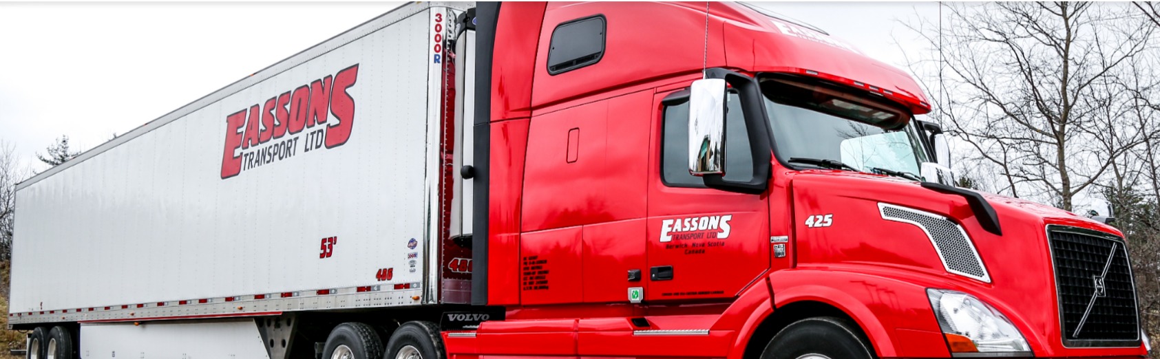 Red Eassons Volvo tractor attached to a branded white refrigerated trailer
