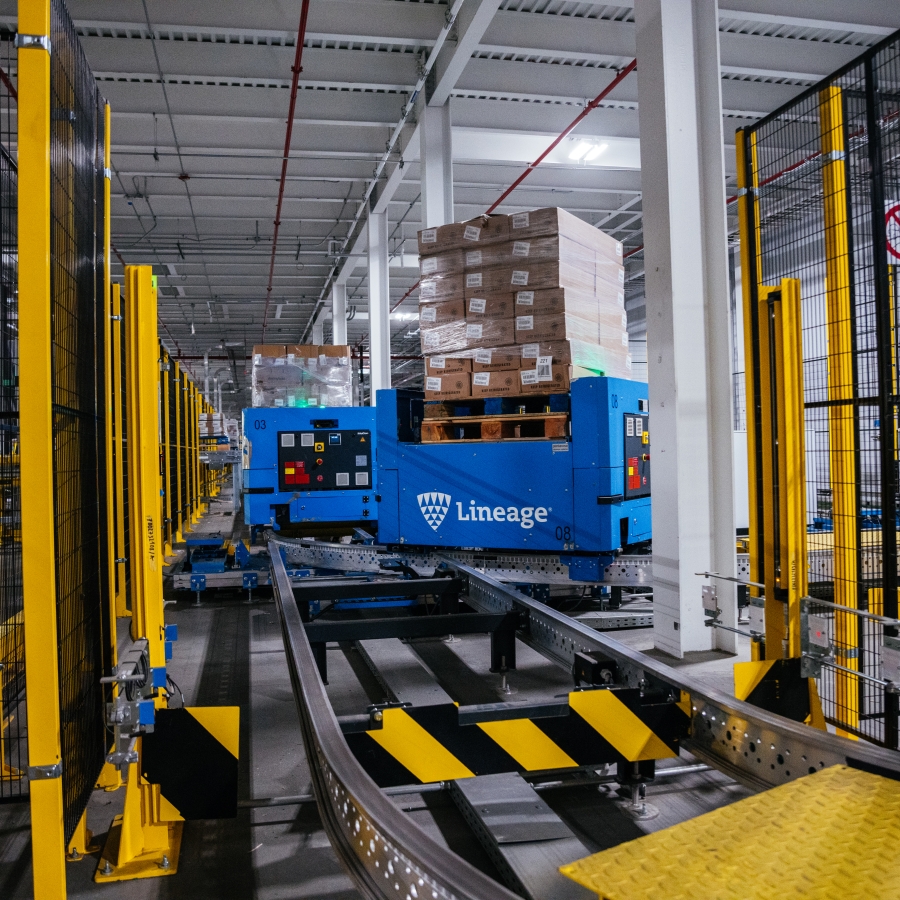 Blue Lineage automated pallet carriers moving freight inside a warehouse