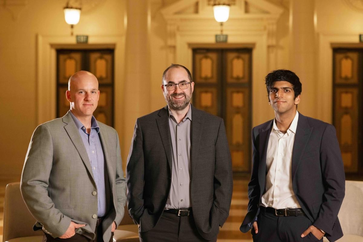 Three people pictured in Pallet’s Prism Logistix customer story