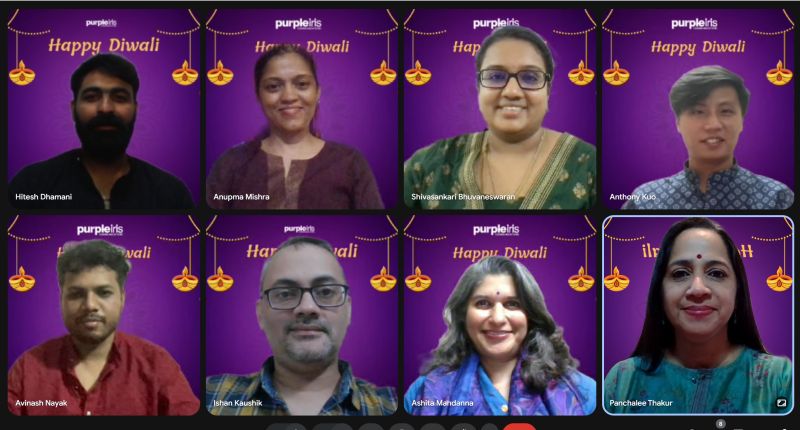 Eight Purple Iris colleagues, including Panchalee Thakur at bottom right, celebrating Diwali together on a video call