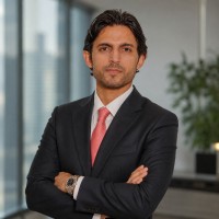 Paranine CEO Ahad Khurshid in a dark suit and pink tie