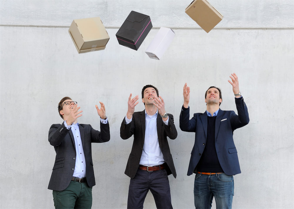 parcelLab’s three founders together in a company photograph