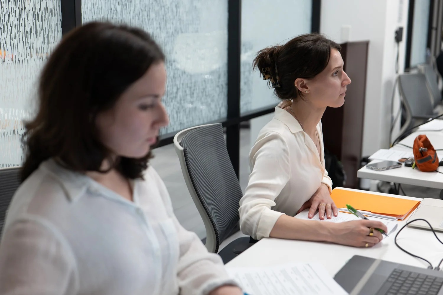 Participants seated around a table during audience research