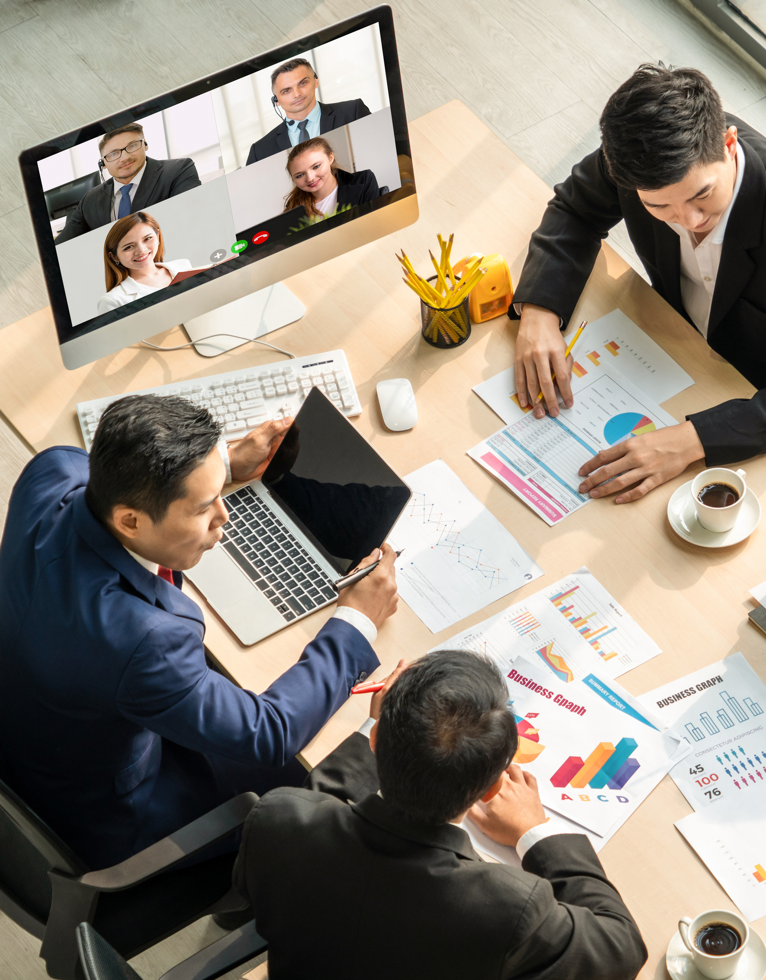 A staged remote and in-office collaboration scene used on the Part Analytics website