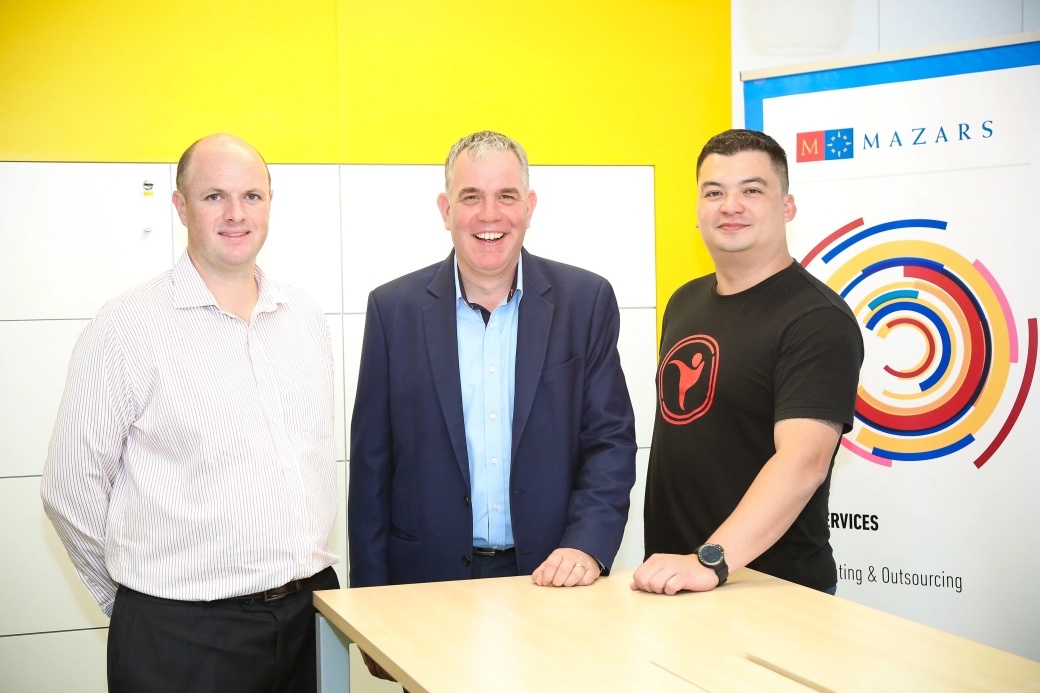 Jonathan Fryer, Rob Hurenkamp and Pascal Henry standing together at the Mazars partnership announcement
