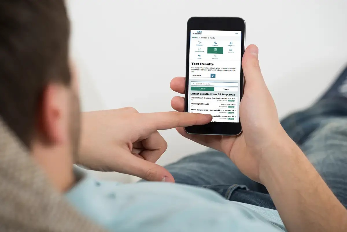 A person viewing Patients Know Best test results on a smartphone