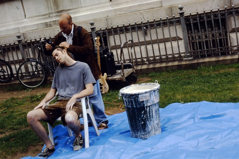 A young Patrick Sheridan having his head shaved during a performance piece at Corcoran