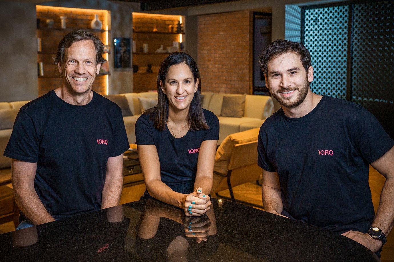 Patrick Sigrist, Beatriz Degani and Bernardo Mergár wearing IORQ shirts
