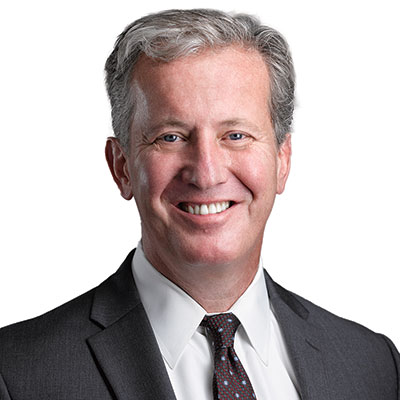 Patrick Taylor in a suit and tie, in the portrait published for Atlanta’s 2024 Smart Business Dealmakers host committee