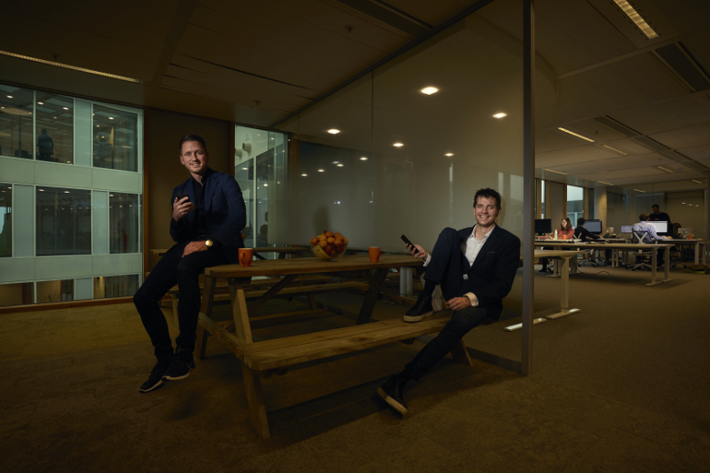 Patrick van der Mijl, left, and Erwin van der Vlist beside a picnic table in Speakap’s office