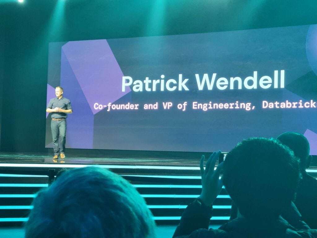 Patrick Wendell presenting Databricks AI capabilities onstage at the 2023 Data and AI Summit