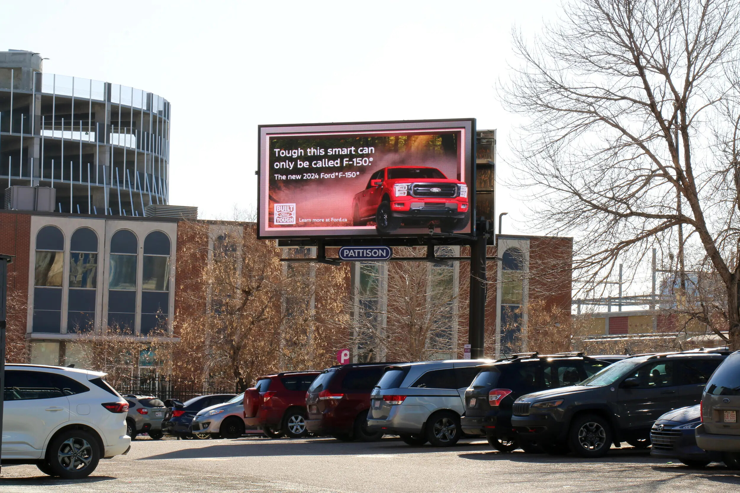 A Ford F-150 campaign displayed on a PATTISON digital billboard in Calgary