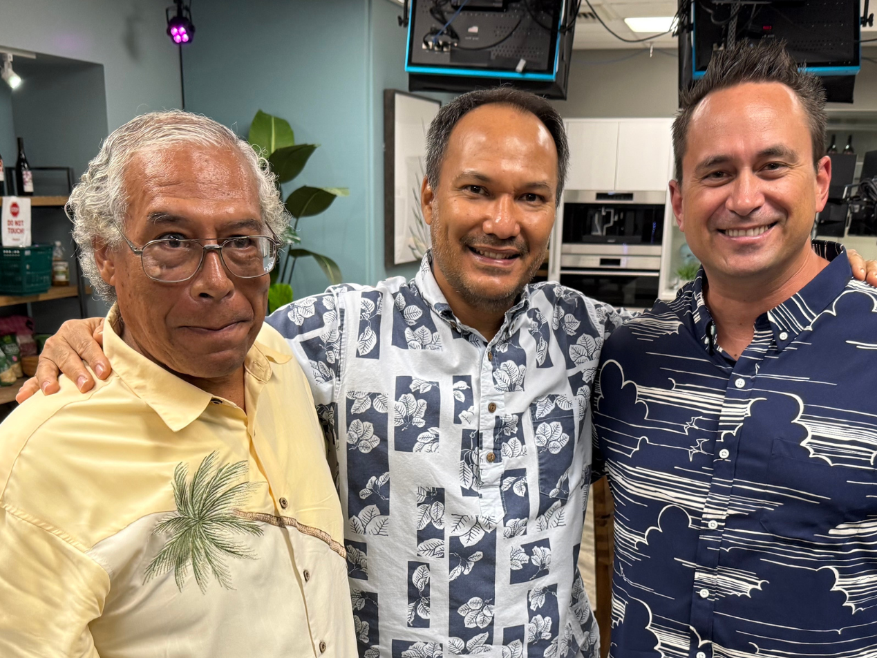 Three Paubox team members posing together in an office